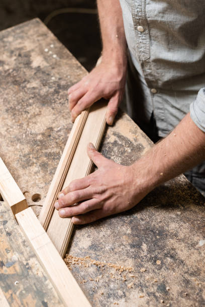 istock Carpenter milling an oak detail 2180546557