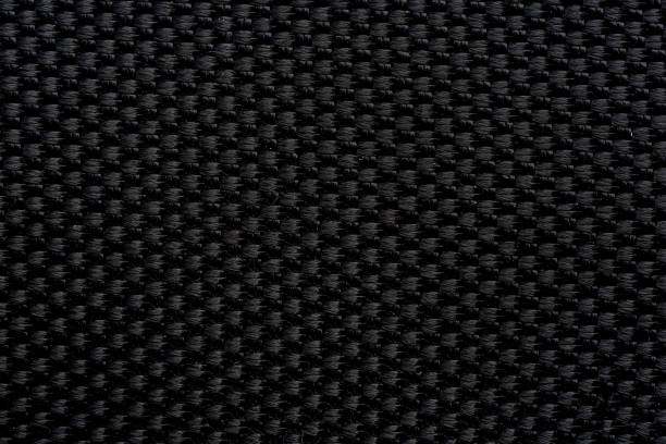 istock Black close-up macro fabric texture,Soft black color ribbed fabric pattern close up as background 2180549897