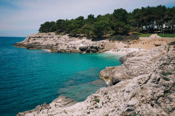 istock Rocky Coastline with Turquoise Waters in Croatia. 2180555115