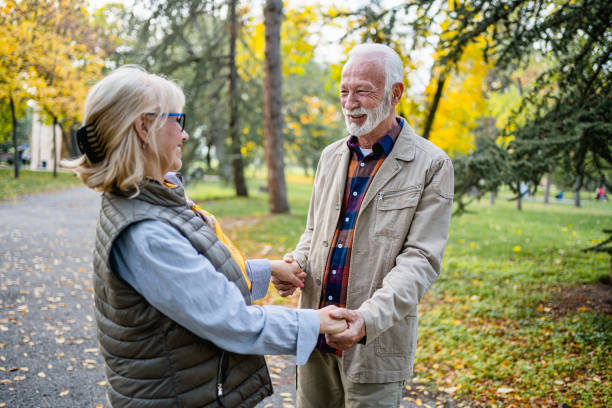 istock Senior couple spending a autumn day in the park 2180558509