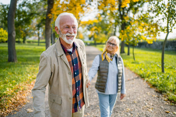 istock Joyful senior couple at the park 2180558698