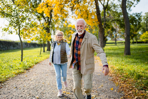 istock Joyful senior couple at the park 2180558928
