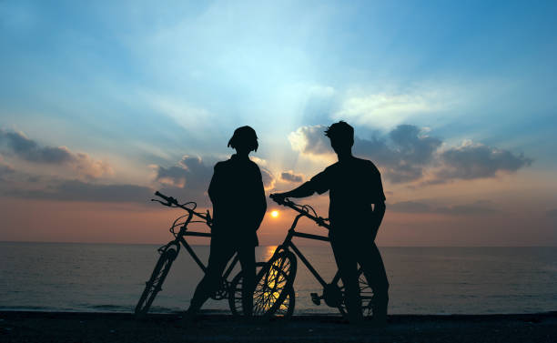People, cycling and mountain bike with beach view on banner for outdoor journey or adventure. Cyclist, friends or fitness with bicycle on mockup space by ocean for extreme ride, exercise or travel