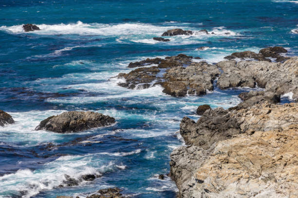 The stunning view at Kasler Point Lookout in Big Sur, California, where the rugged coast meets the vast Pacific Ocean.
