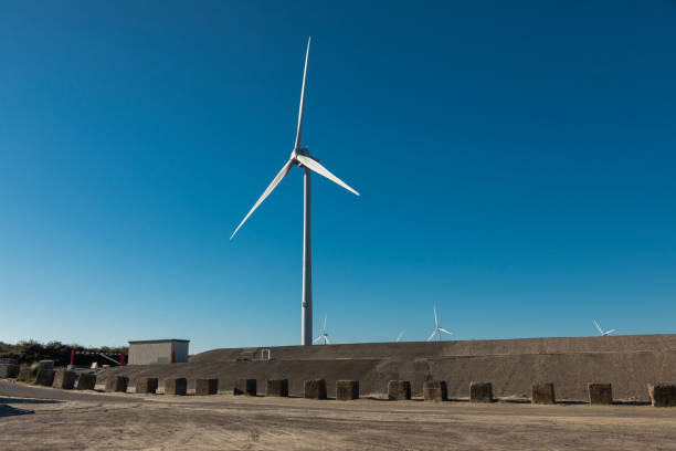 An outdoor power windmill turbine site