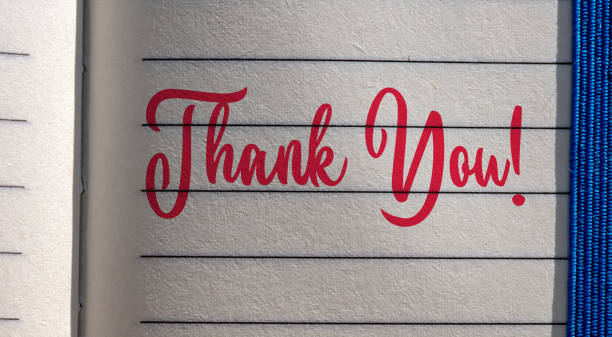 istock THANK YOU! written on a notebook page 2180581914