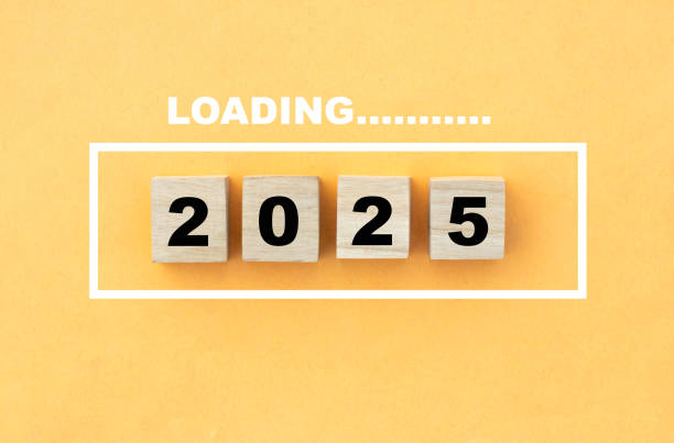 istock wooden cube loading 2025 Happy New Year 2025 Team teamwork Strategy goal Money Budget investment financial and New Year Resolution concept 2180583210