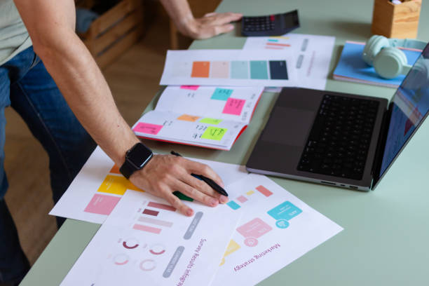 istock Marketing manager analyzing market data and business growth charts 2180584700