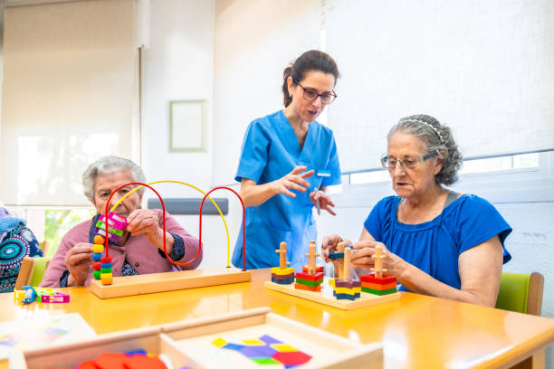 istock Elderly people playing skill games in the nursing home 2180586839
