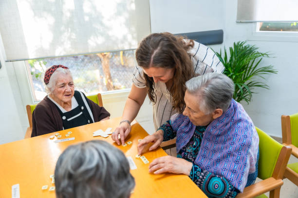 istock Senior women playing skill board games in the geriatrics 2180586931