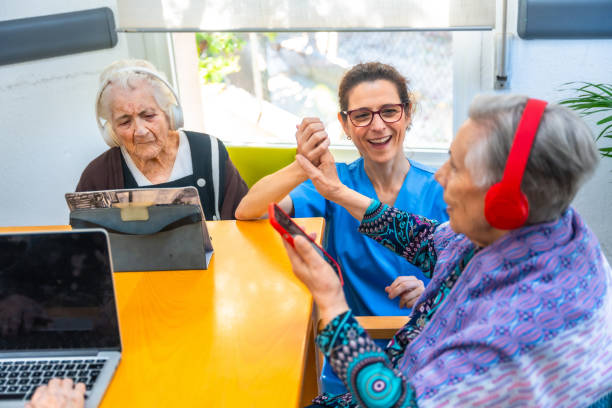 istock Senior women and nurse using technology in the geriatrics 2180586980