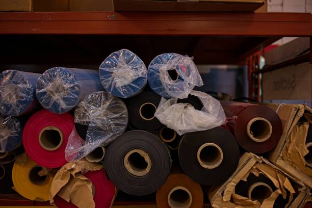 istock Colorful Rolls of Fabric in Storage 2180592828