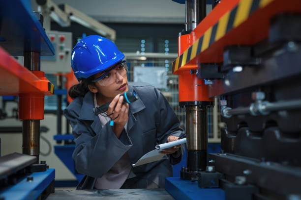 istock Female engineer check control heavy machinery 2180607523