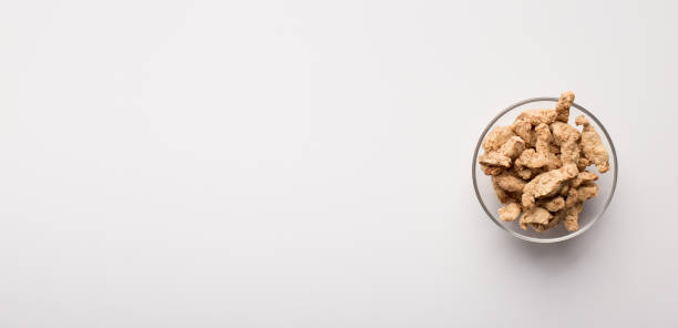 istock Meat substitute. Soy meat in glass bowl 2180610003