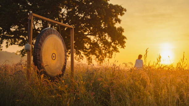 istock Sunset Gong Meditation in Serene Meadow 2180615451