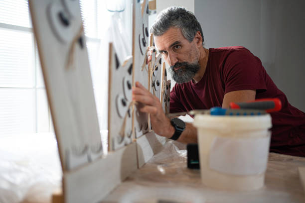 istock Artist Doing Woodworking Project With Joy. Art & Craft. 2180615533
