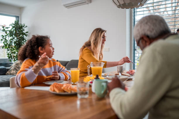 istock Diverse Family Enjoying Breakfast Together at Home 2180617358