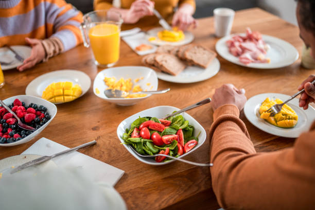 istock Diverse Family Enjoying Breakfast Together 2180617368