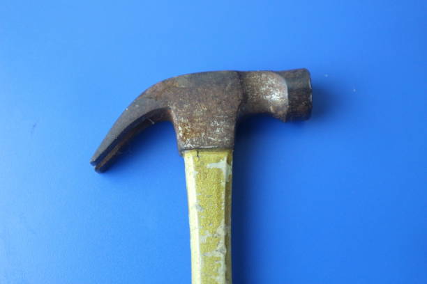 istock iron hammer on blue background, bali 24 october 2024 2180641063