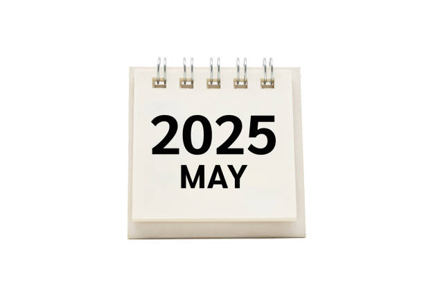 istock 2025 MAY text on desk calendar with clipping path isolated on white background. 2025 MAY and Calendar concept. 2180641169