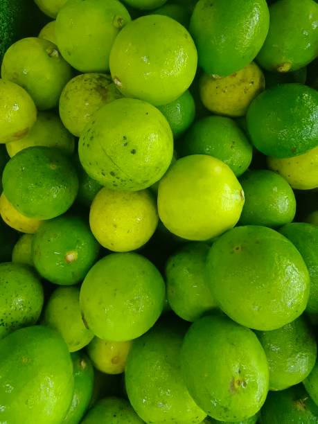istock Defocused view of key lime at the market 2180651577
