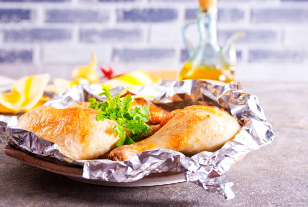istock Cooked legs of chicken with spices 2180655657