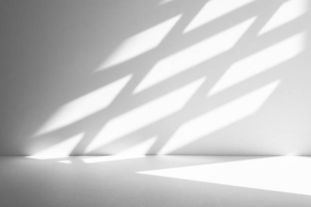 istock Wall interior background, studio and backdrops show products.with shadow from window color white . background for text insertion and presentation product 2180659859