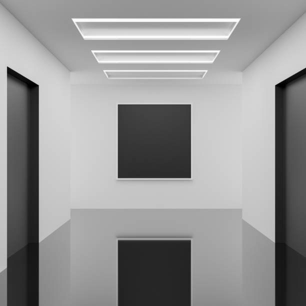 istock An empty picture frame for an exhibit is mounted on a white wall in a hallway corridor. 2180663590