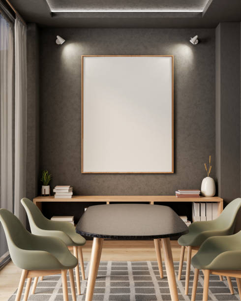 istock An empty picture frame for an exhibit is mounted on a grey wall in a contemporary dining room. 2180663623