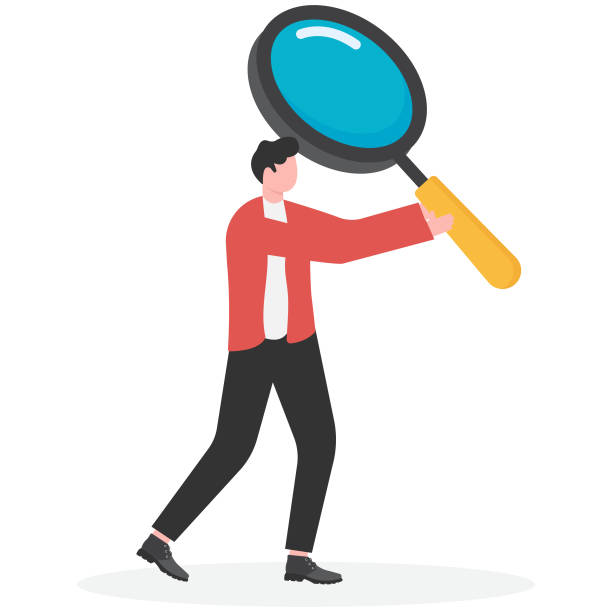 istock Businessman with magnifying glass to analyze himself. Self-assessment, find plan, goals life or work. 2180666161