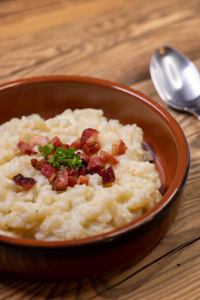istock Slovakian halusky served with sheep cheese and roasted bac 2180671969