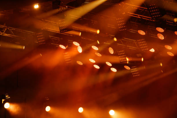 istock Red-orange color on stage at a concert 2180673939