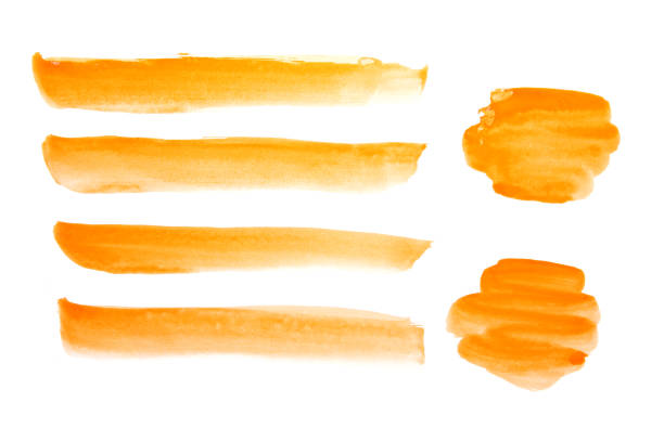istock orange watercolor paint 2180676906