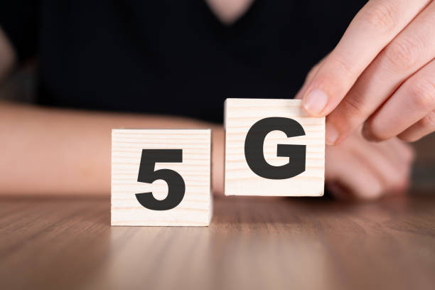 istock 5G word with wooden blocks on table 2180677164