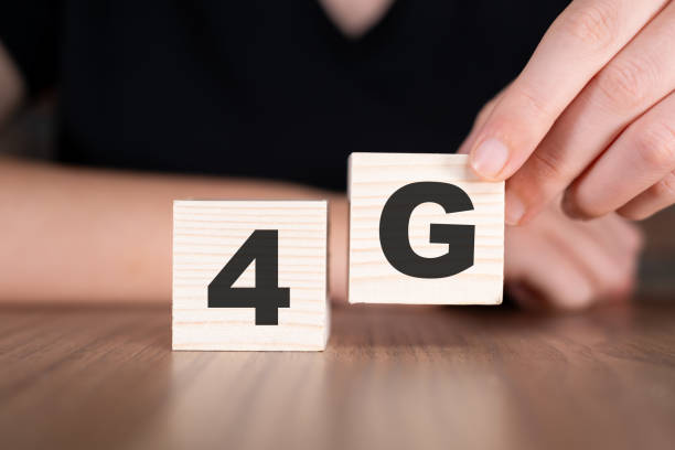 istock 4G word with wooden blocks on table 2180677294