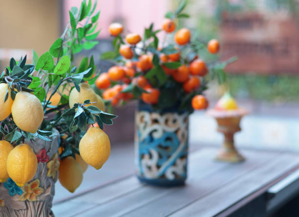 Appetizing sweet orange juice and one drinking glasses standing on a white table in the kitchen for a breakfast. Healthy light meals for breakfast