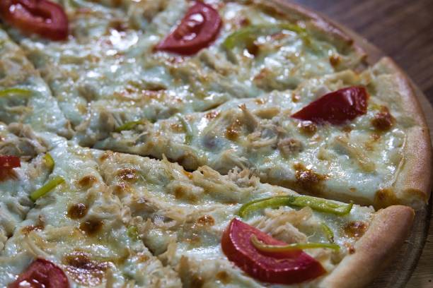 istock Chicken and Tomato Pizza With Green Peppers 2180680228