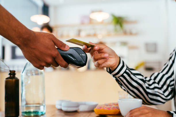 istock Barista working in a bar cafeteria 2180680622