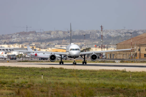 Luqa, Malta - October 22, 2024: National Geographic (Icelandair) Boeing 757-256 (Reg.: TF-LLL) entering runway 13 for take off to Marrakesh, Morocco.