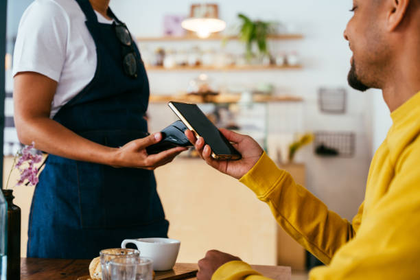 istock Barista working in a bar cafeteria 2180681188