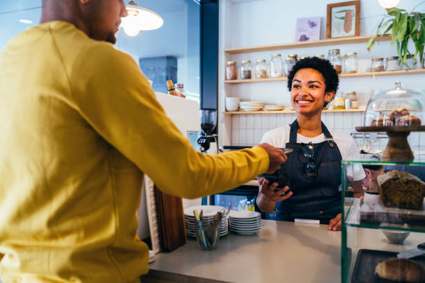 istock Barista working in a bar cafeteria 2180681233