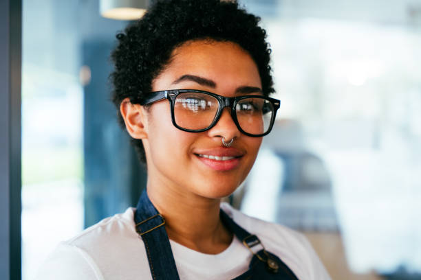 istock Barista working in a bar cafeteria 2180682061