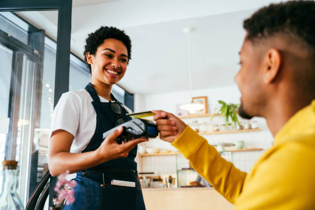 istock Barista working in a bar cafeteria 2180682804