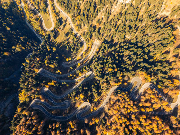 istock Curving Mountain Road Through Forest in Autumn 2180683140