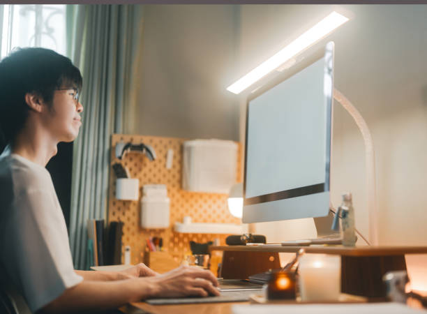 istock Focus on computer monitor freelance lifestyles working from home 2180683299
