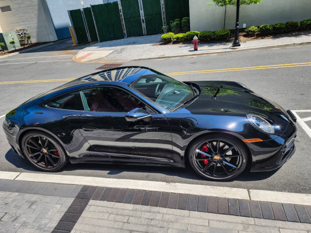 Vilnius, Lithuania - June 20, 2024: Classic Porsche 911SC (G-model) parked at the side of the road. After full restoration, painted in smart silver colour, with period correct RUF wheels.