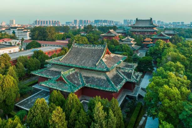 istock Chinese architecture with green trees 2180684117