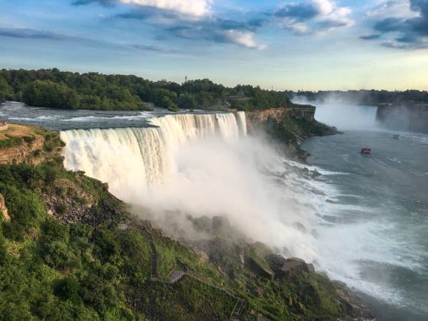 istock Scenic view of Niagara Falls with mist and boat. 2180684815