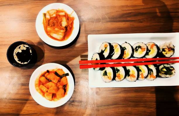 istock Gimbap with kimchi and side dishes 2180687177