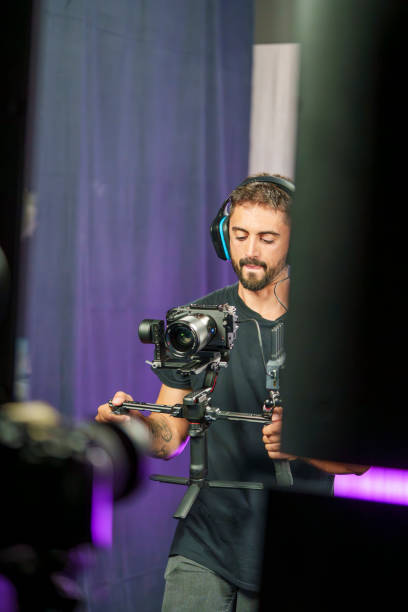 istock Camera Operator Filming on a Professional TV Set 2180688261